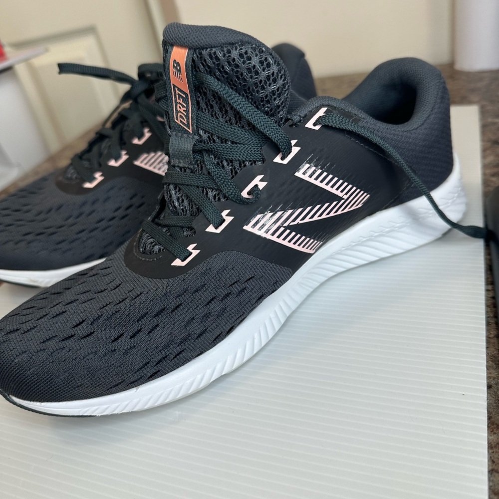 Women’s New Balance DRFT grey and pink. Size 9 WIDE.